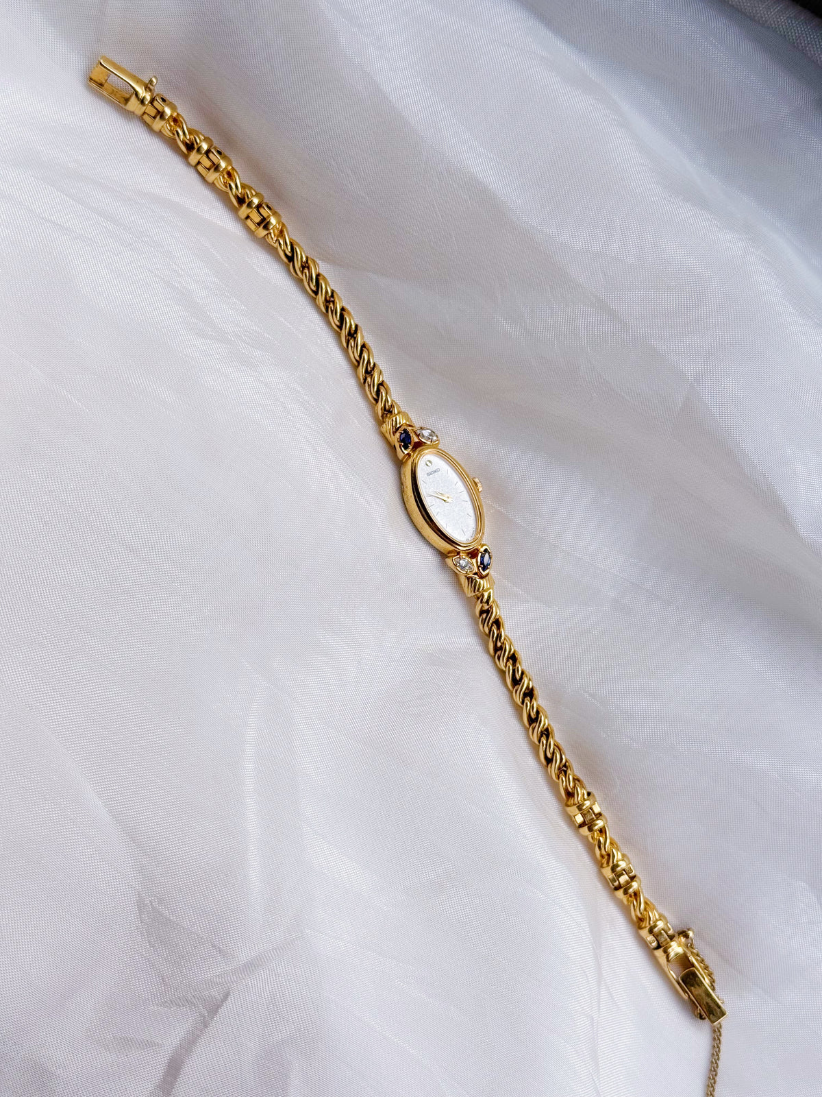 Vintage Seiko Oval Watch: Gold Plated Rope Bracelet, Blue & White Stones (Japan Made)