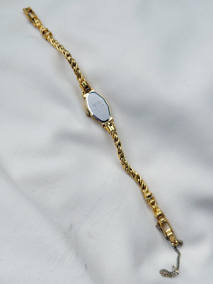 Vintage Seiko Oval Watch: Gold Plated Rope Bracelet, Emerald & White Stones