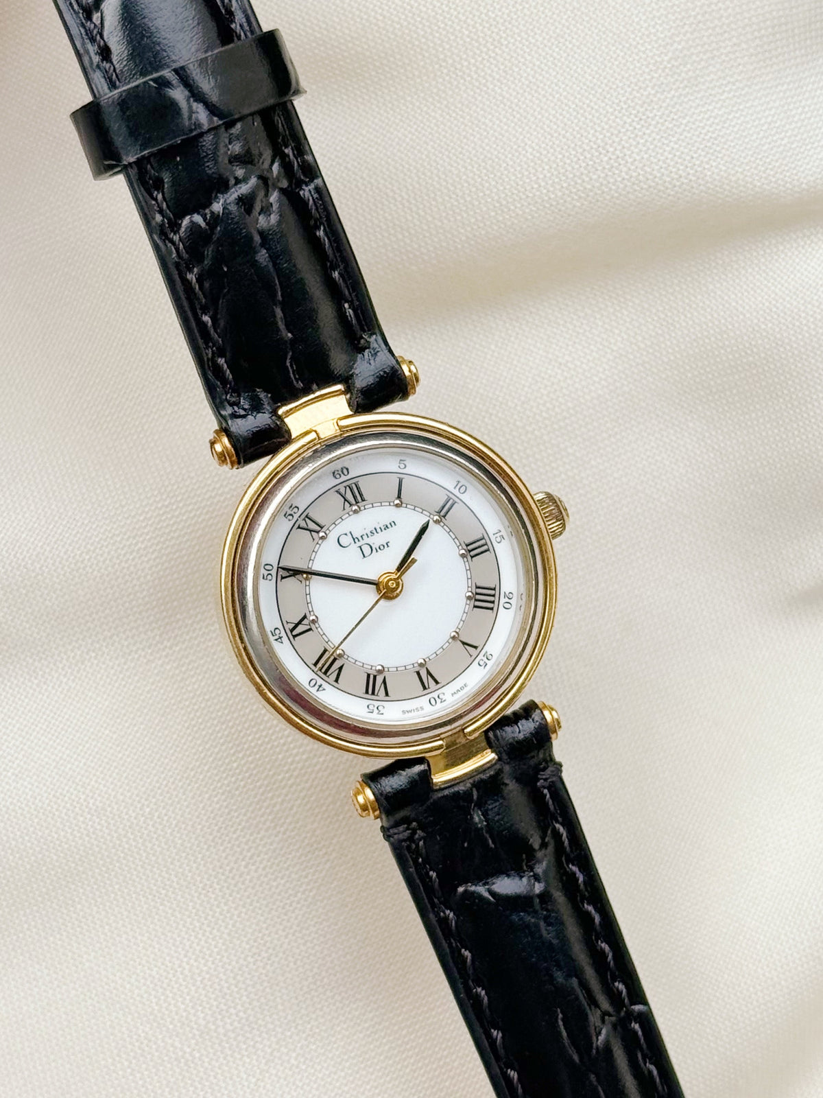 Christian Dior gold plated Roman dial watch for women; Leather strap