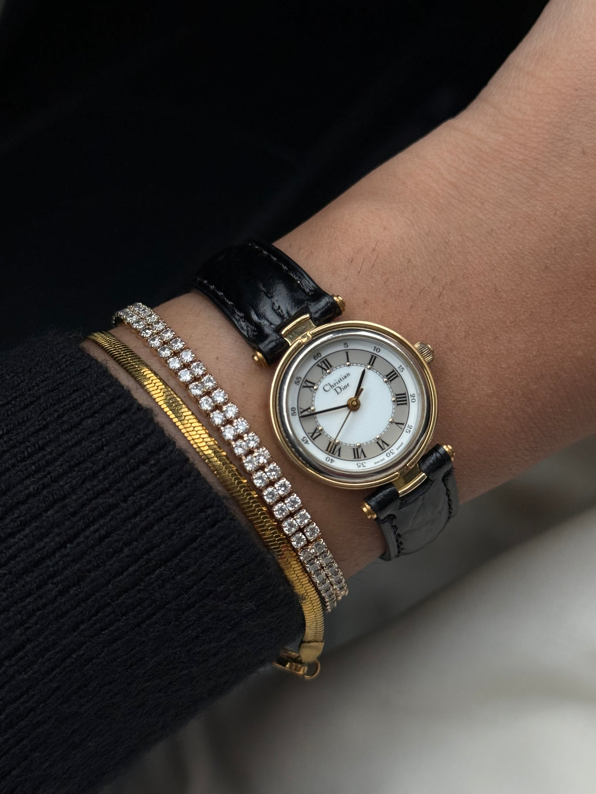 Christian Dior gold plated Roman dial watch for women; Leather strap