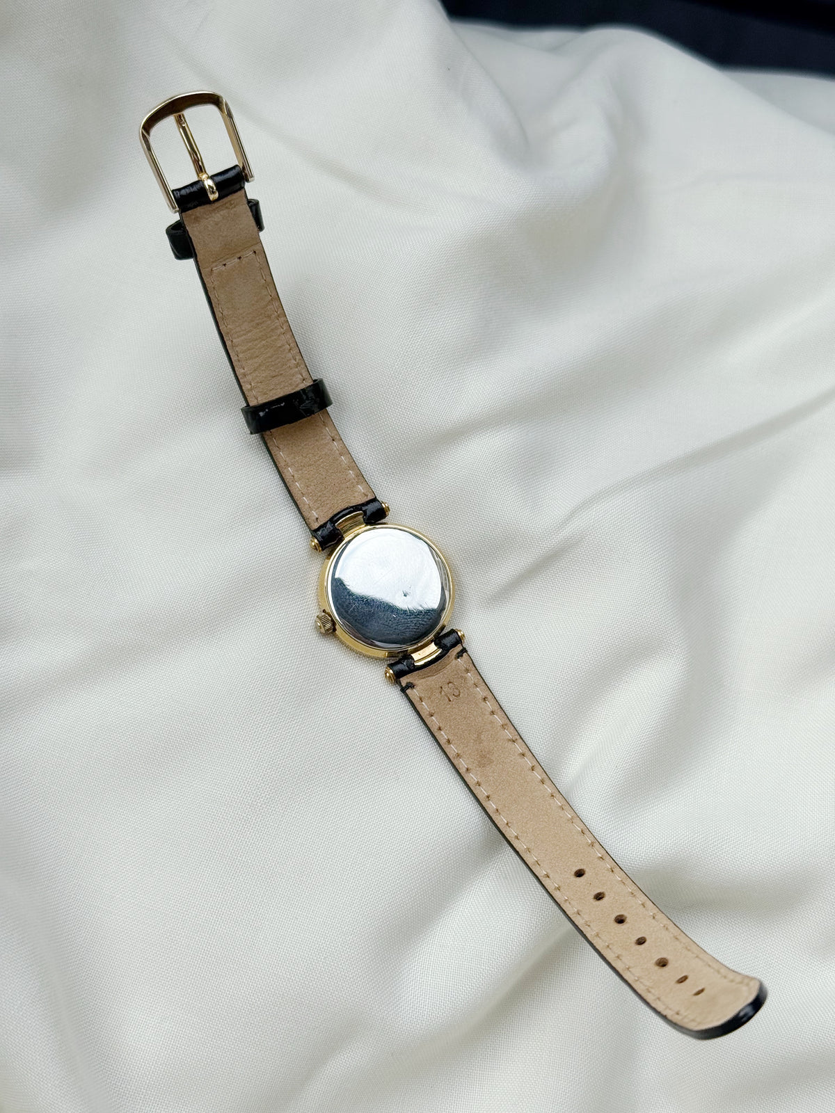 Christian Dior gold plated Roman dial watch for women; Leather strap