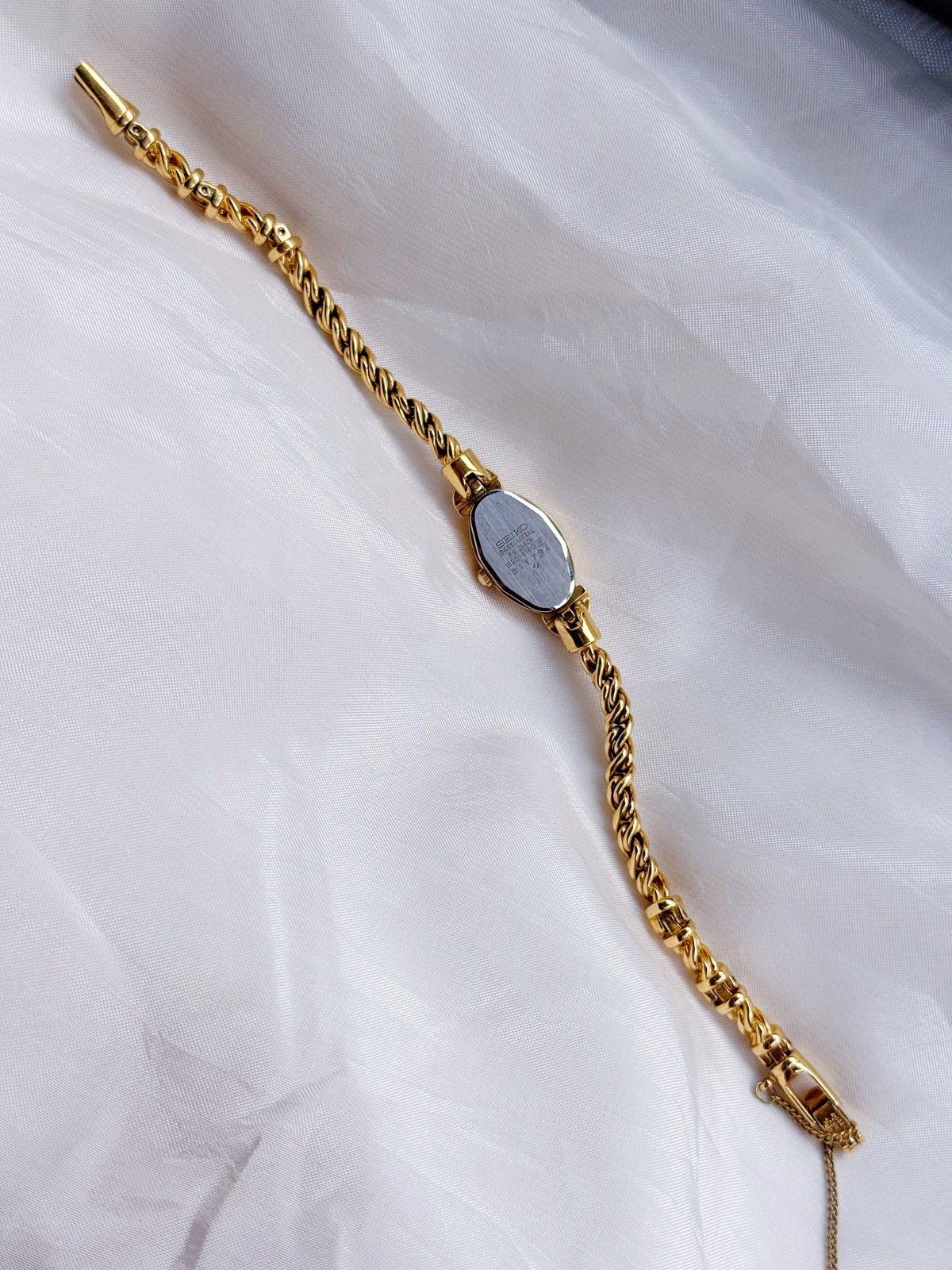 Vintage Seiko Oval Watch: Gold Plated Rope Bracelet, Blue & White Stones (Japan Made)