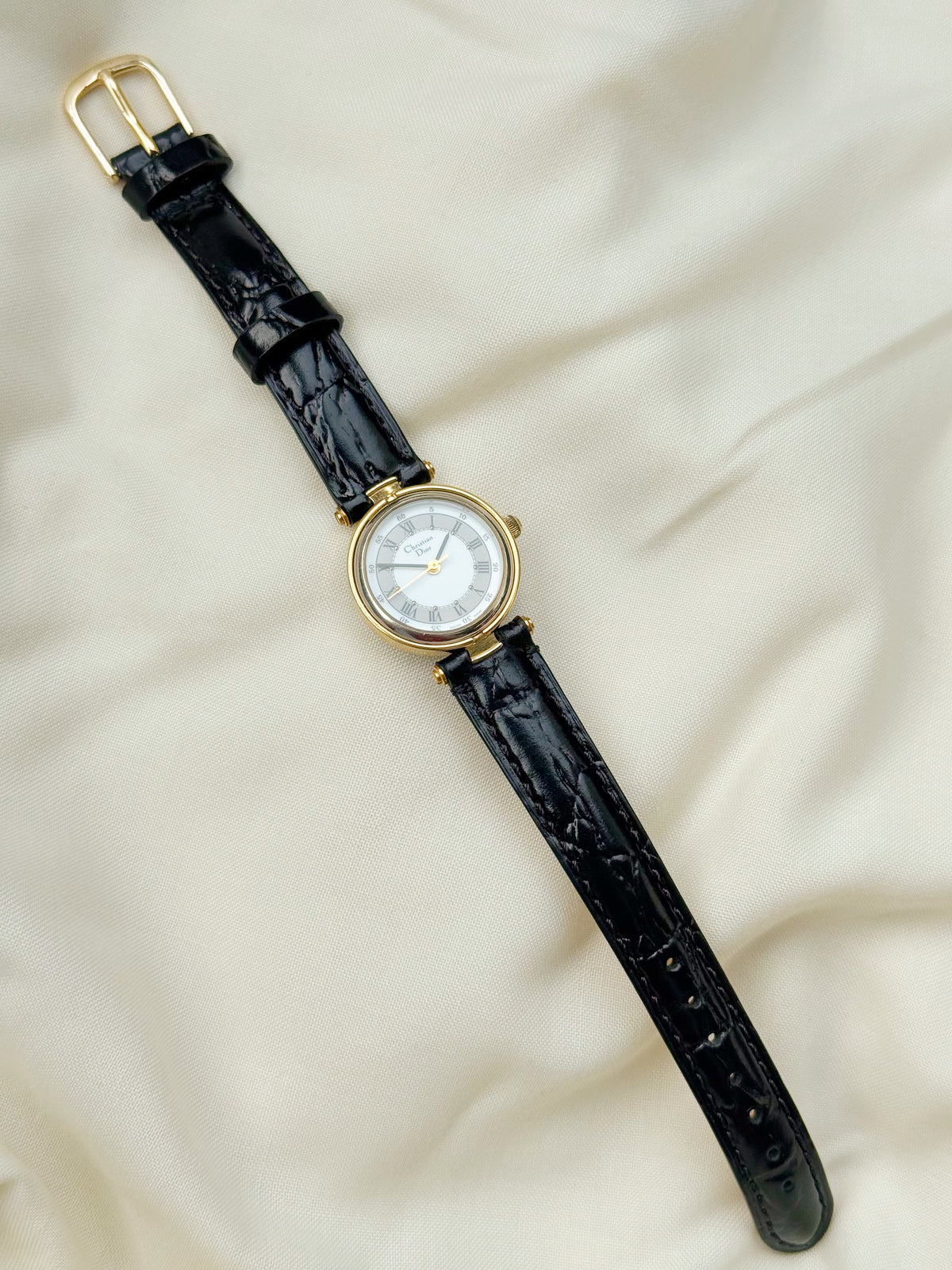 Christian Dior gold plated Roman dial watch for women; Leather strap