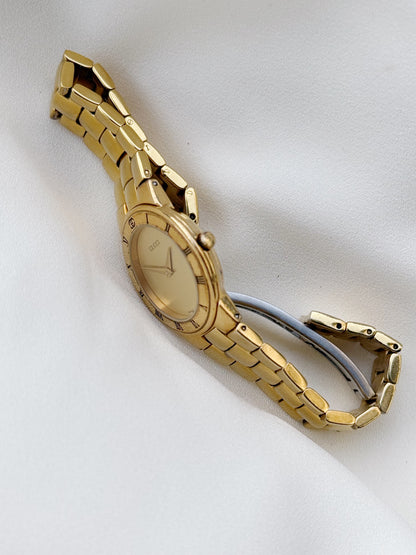 Vintage Gucci 3300.2.L gold plated watch for women
